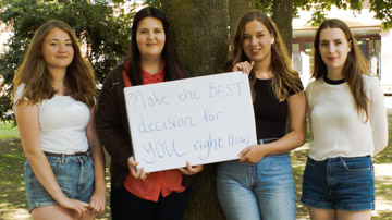 Image: Girls with sign outside