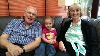 John Haigh with his wife and granddaughter