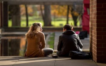 Students sat by Falmer House