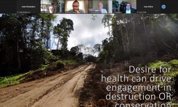 A screenshot of the powerpoint presentation showed during the final talk on integrating health and conservation. Image shows road leading into a forest. Text reads 
