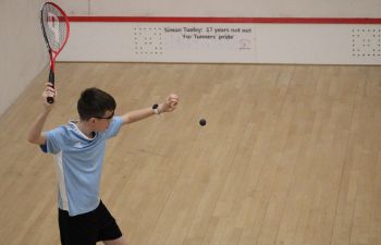 Child playing squash