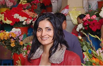 Professor Raminder Kaur picture around flowers