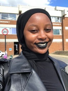 A photo of BSc International Business final year student, Joy Semugooma