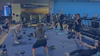 A group of people circuit training in the gym