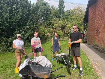 Global Studies PS staff volunteering at community garden