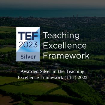 An image of the University campus nestled against the South Downs with text reading 'Teaching Excellence Framework. / Awarded silver in the Teaching Excellence Framework (TEF) 2023
