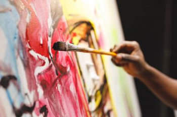 A person painting.