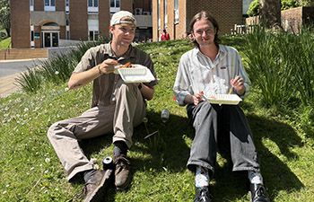 students enjoying food waste day in the sun