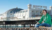 Student in front of Brighton Pier