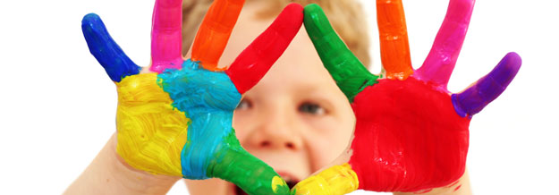 Coloured brain, child with painted hands in various colours and colour wheel
