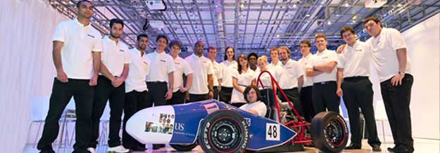 Formula students with car