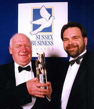Mike Herd (right) receiving his award