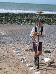 At risk: Marker pebbles are surveyed in beach research at Sussex