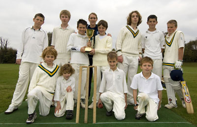 Rosalie, members of St Matthias Under 14s and Under 16s teams and the county championship trophy