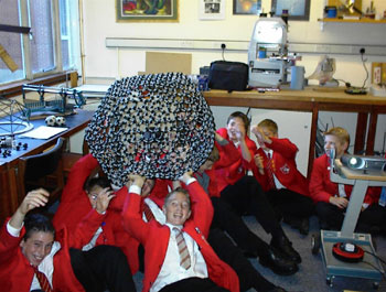 Schoolchildren getting their hands on Jonathan Hare's buckyballs