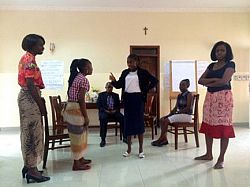 ‘Girl Researchers’ in DRC doing a role play as part of their training