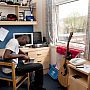 Student in his Park Village bedroom