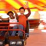 International students having fun on one of the rides on Brighton Pier