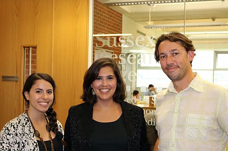 A photograph of the three Sussex Research Hive Scholars sitting outside the Research Hive