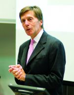Vice-Chancellor, Professor Michael Farthing, talking in front of a lecturn