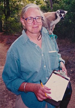 A lemur sitting on Alison Jolly's shoulder