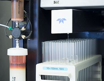 A close-up of drug discovery equipment, including various test tubes