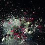 A photo capturing the moment a bouquet of flowers is caught in an explosion