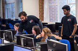 Students from Seaford Head try their hand at Computer Aided Design (CAD) software as part of the University of Sussex's 'Design a Racing Car Day'