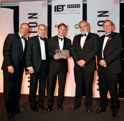 Five men, including Sussex Uni's Professor Robert Prance, receiving the IET Award.