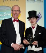 Professor Bob Allison, Pro-Vice-Chancellor (Research) presents the 2012 Enter-priZe competition trophy to student Joshua Feldman