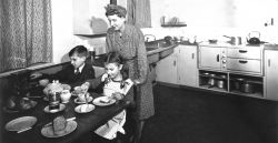 Children in post-war kitchen