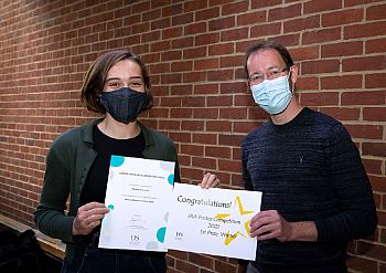 Student Phoebe Valentine winning JRA poster competition