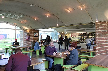 Customers enjoying their drinks in Arts Piazza