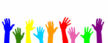 image of lots of different coloured raised hands