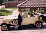 wedding couple in vintage car