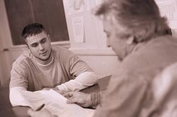 older man advises youth older man advises youth