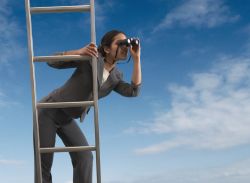 woman up ladder with binoculars woman up ladder with binoculars