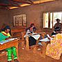 Teachers marking student papers in a Bambui school (Photo by EWB Challenge team, May 2014)