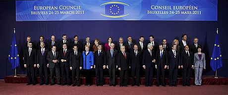 The European Council in 2011, lining up under a banner with the European Council logo