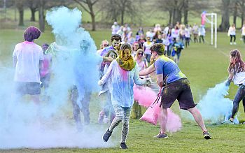 Students enjoying a Holi colour run event as part of One World Week