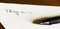 Pen and paper. On paper is written 'Things to do'.