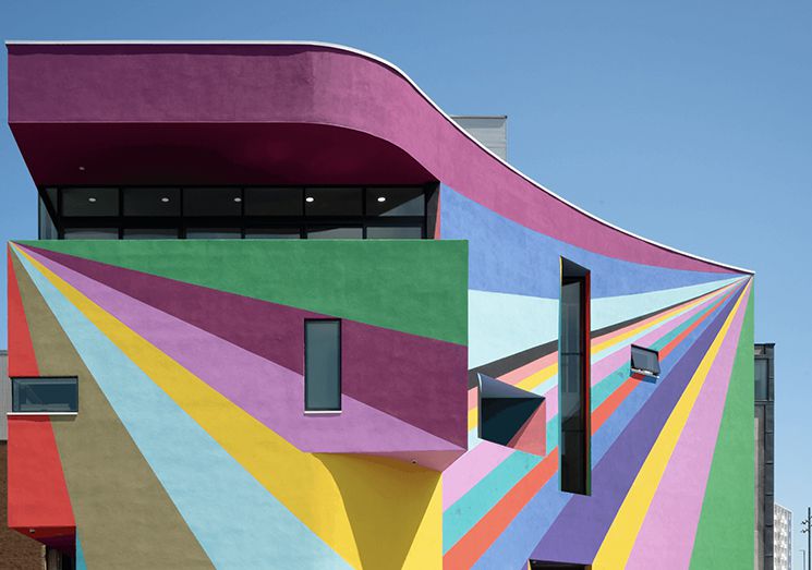 Photograph of the Towner building, painted in colourful stripes.
