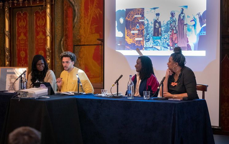 Four people of colour on a panel in the Royal Pavilion, Brighton