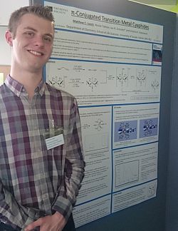 Matt presenting a poster at the southern dalton meeting 2015