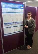 Sam with her prize-winning poster at the Dalton 2018 meeting
