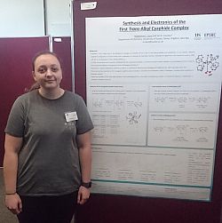 Maddie with her poster at the Dalton 2018 meeting