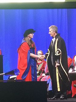 Maddie receiving her degree from the VC