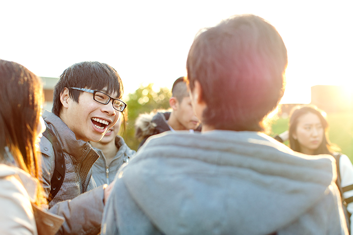 International students socialise on campus at the University of Sussex
