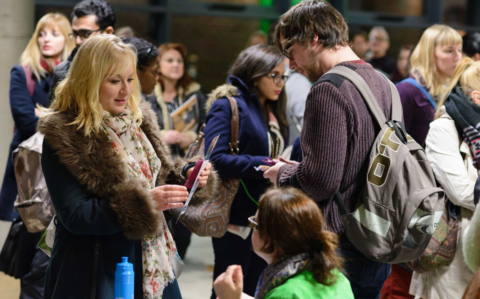 Students talking at a recruitment fair