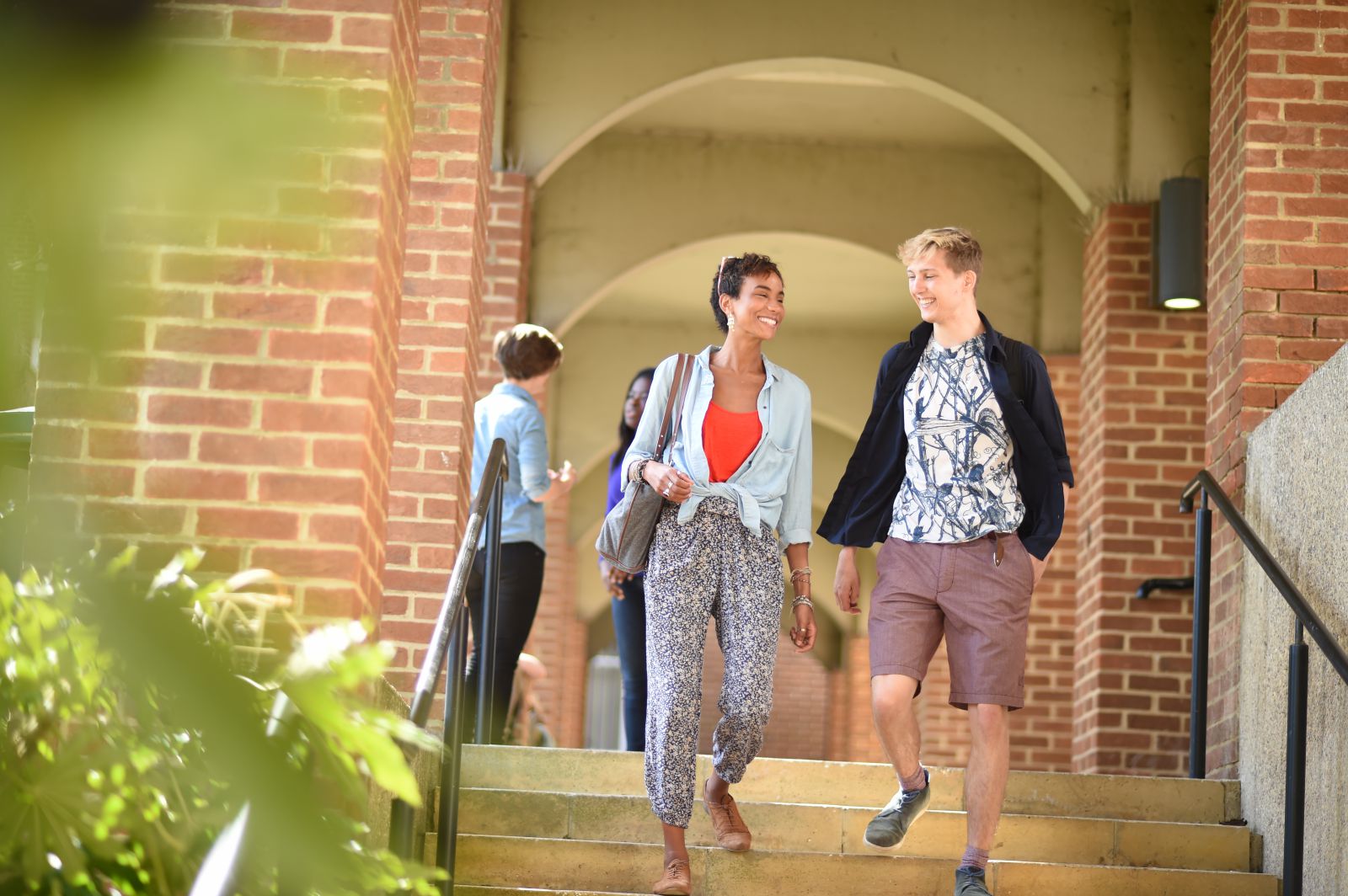 Students walking on campus at the University of Sussex